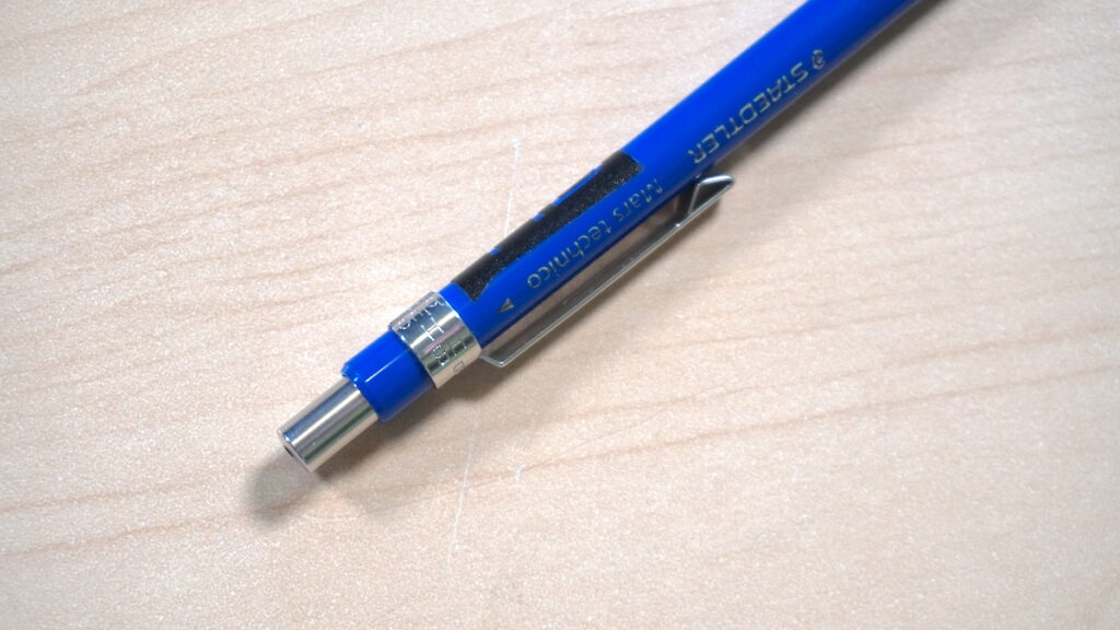 A clutch pencil showing the hardness grade indicator